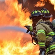 Firefighters putting down a fire; how to deal with the aftermath of a fire in your community.
