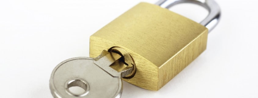 Photo of a lock - how to protect your property management company from scams.