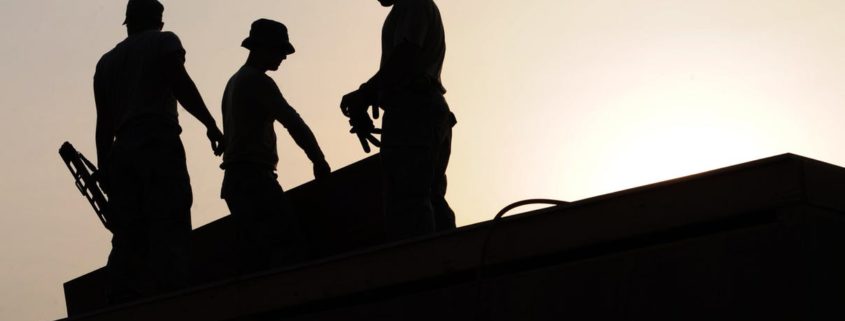 Maintenance/construction workers on site. Photo Credit: Pexels.