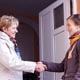 An image of two women shaking hands. Blog article - learn how to improve transparency in your HOA or property management communication efforts.